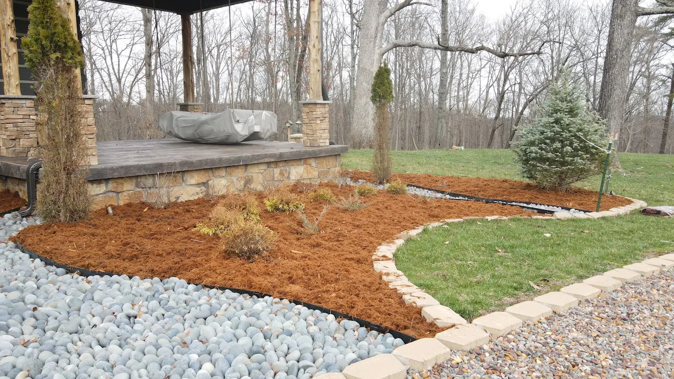 Finished mulch, stone and planting by Lex